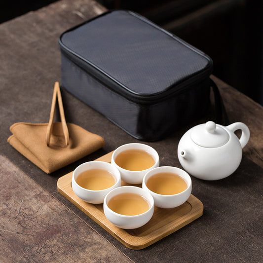 Portable One Pot and Four Cups Dehua Ding Kiln Tea Set